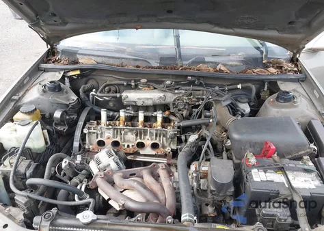 1999 Toyota Camry Le from USA, damaged, VIN 4T1BG22K3XU871911